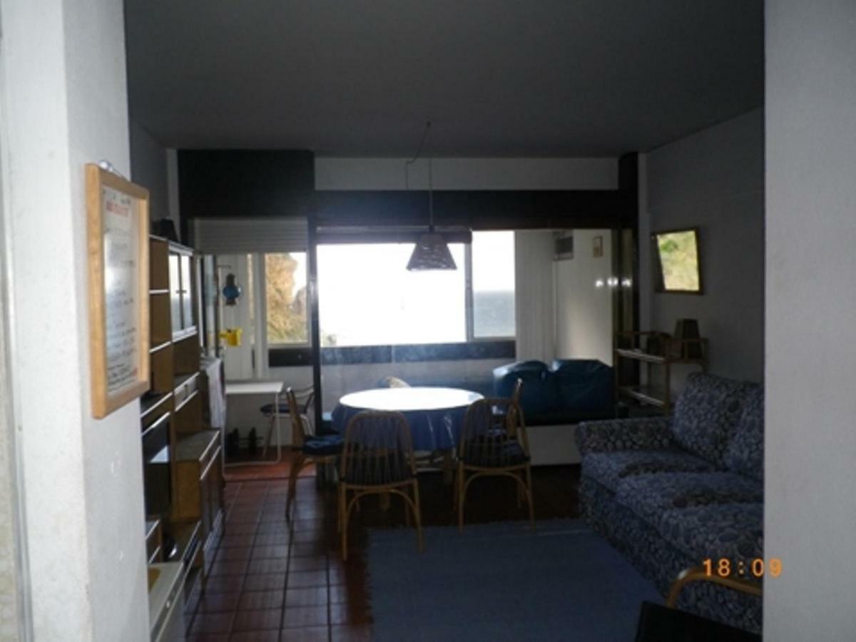 Estudio T0 sobre a praia Sesimbra Exterior foto
